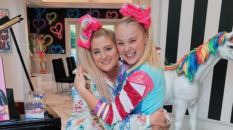 Meghan Trainor and Jojo Siwa smiling