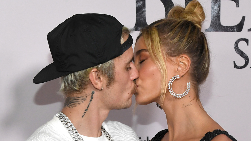 Justin and Hailey Bieber kissing