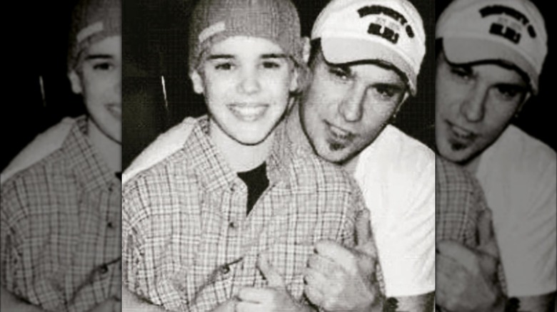 Justin Bieber and Jeremy Bieber embracing