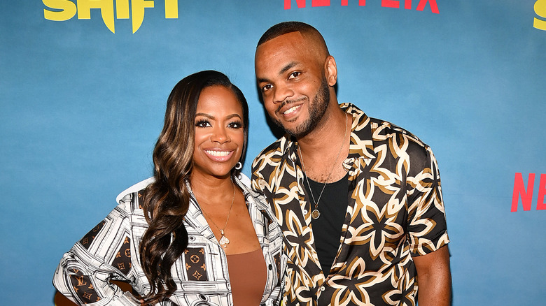 DonJuan Clark poses with Kandi Burruss