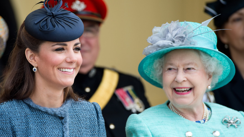 Queen Elizabeth and Kate Middleton at event 