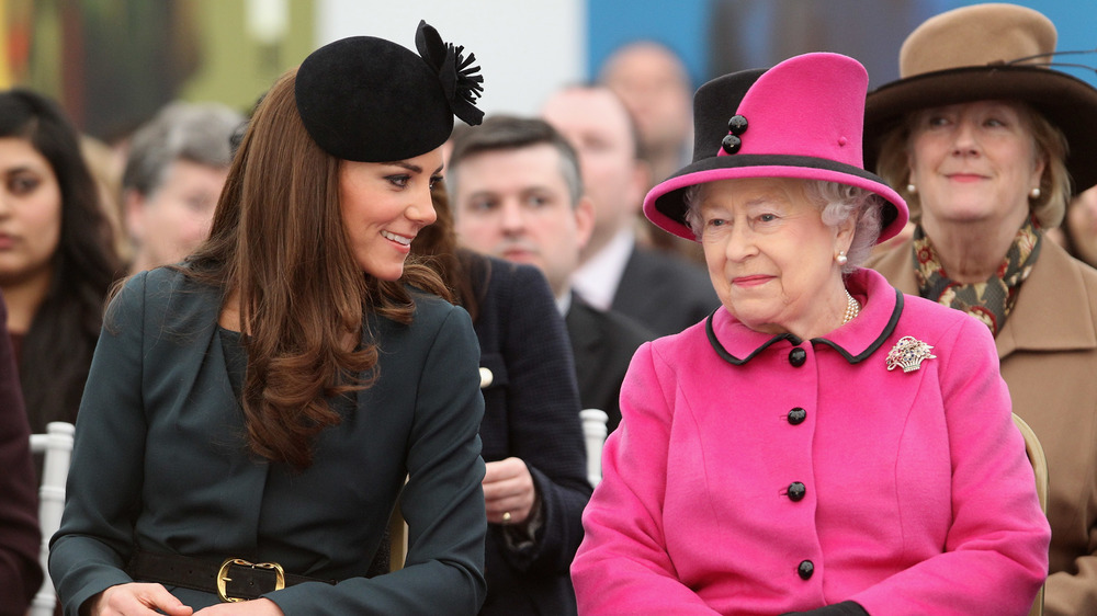 Kate Middleton speaking with Queen Elizabeth