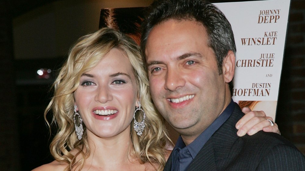 Actress Kate Winslet and director Sam Mendes attends the "Finding Neverland" premiere