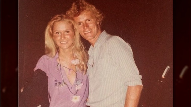 Young Kathy and Rick Hilton smiling