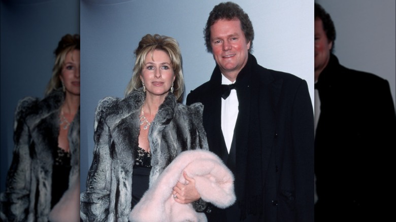 Kathy and Rick Hilton attending party