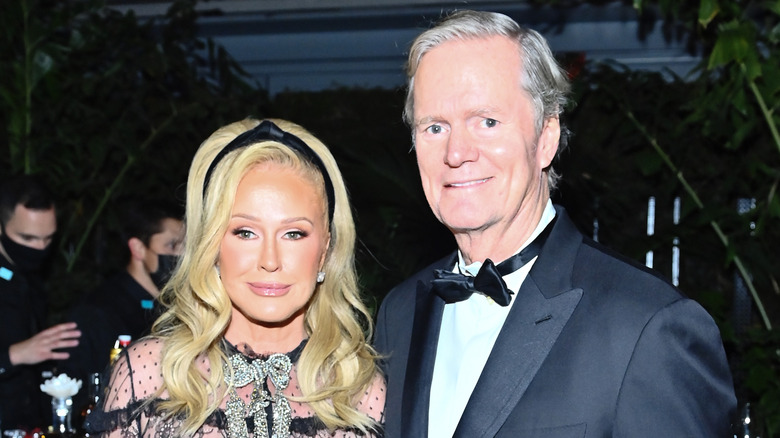 Kathy and Richard Hilton posing at an event