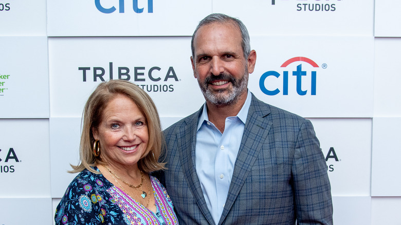 Katie Couric and John Molner posing