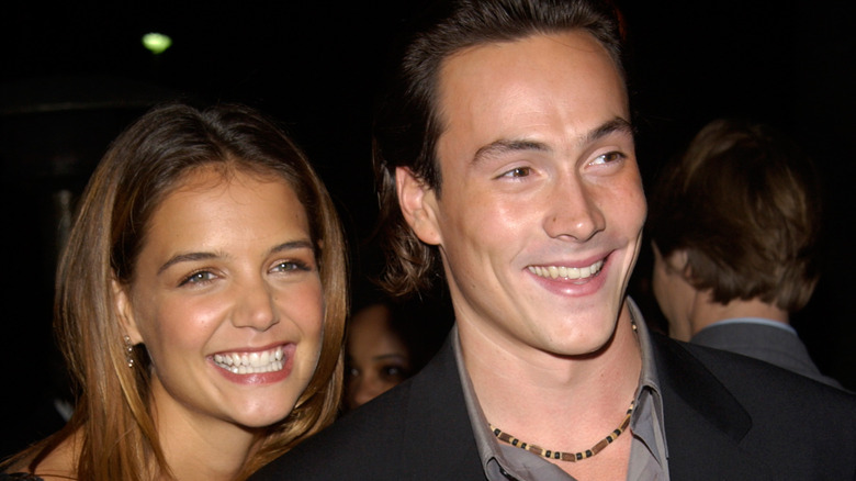 Katie Holmes and Chris Klein smile side by side