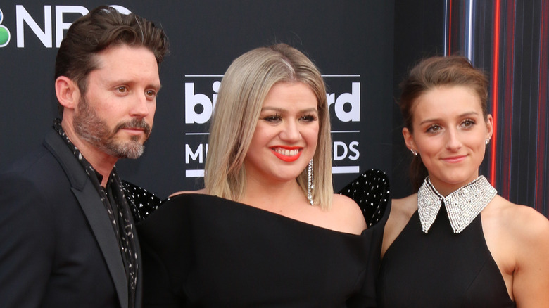 Brandon Blackstock, Kelly Clarkson, and Savannah Blackstock on the red carpet