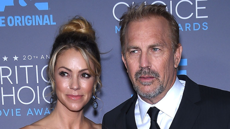 Christine Baumgartner and Kevin Costner posing