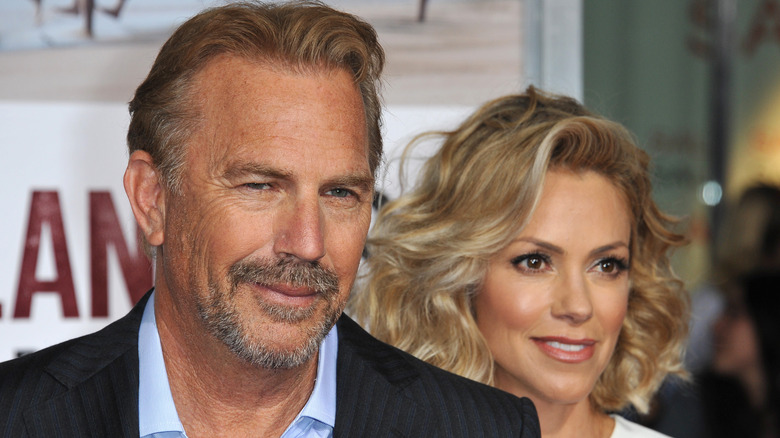 Kevin Costner and Christine Baumgartner posing