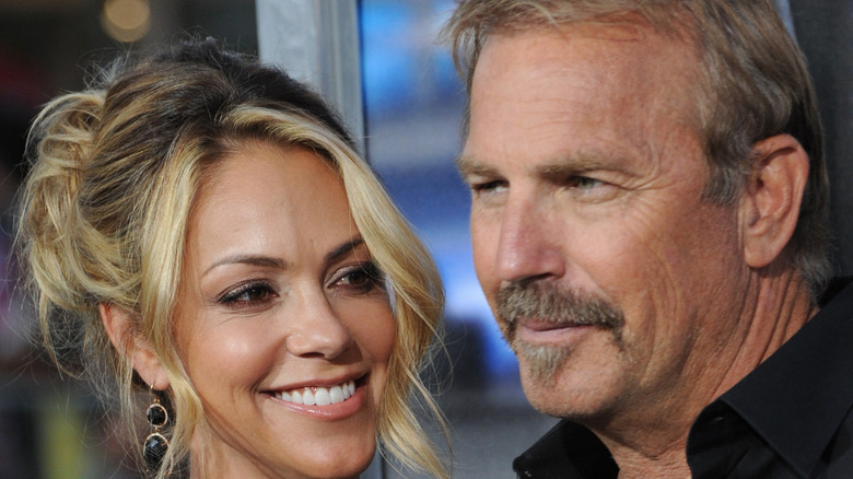 Christine Baumgartner and Kevin Costner smiling