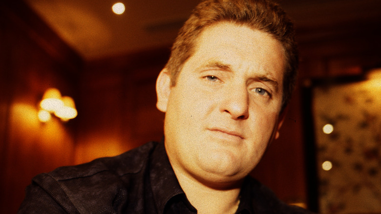 Late actor Chris Penn posing