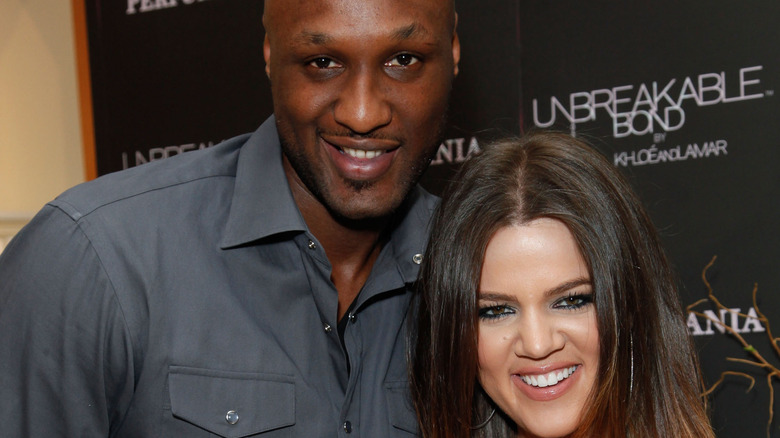 Lamar Odom and Khloé Kardashian smiling 