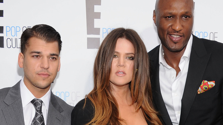 Rob Kardashian, Khloé Kardashian, and Lamar Odom posing together