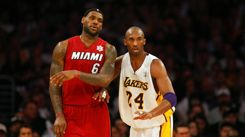 LeBron James and Kobe Bryant in a game