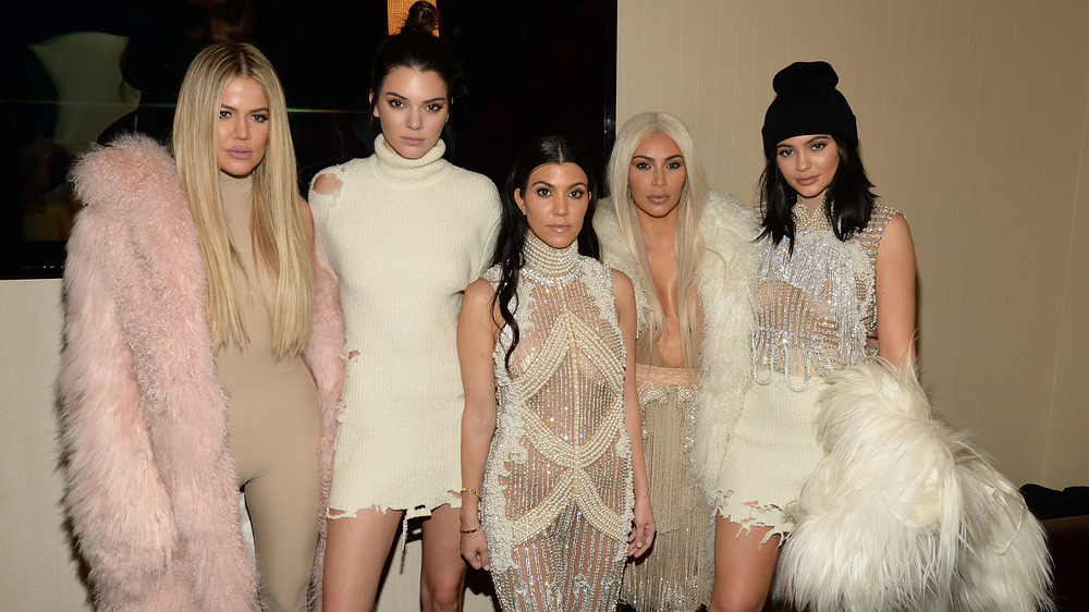 The Kardashian girls pose at the Kanye West Yeezy show