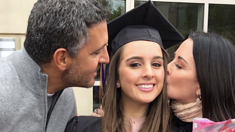 Mauricio Umansky, Kyle Richards, kissing daughter Alexia Umansky at graduation 