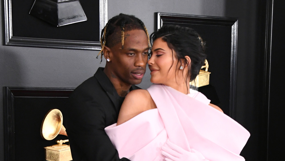 Kylie Jenner and Travis Scott pose together at the Grammy awards