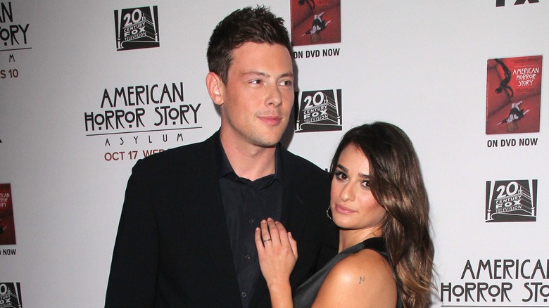 Cory Monteith and Lea Michele cuddling on the red carpet