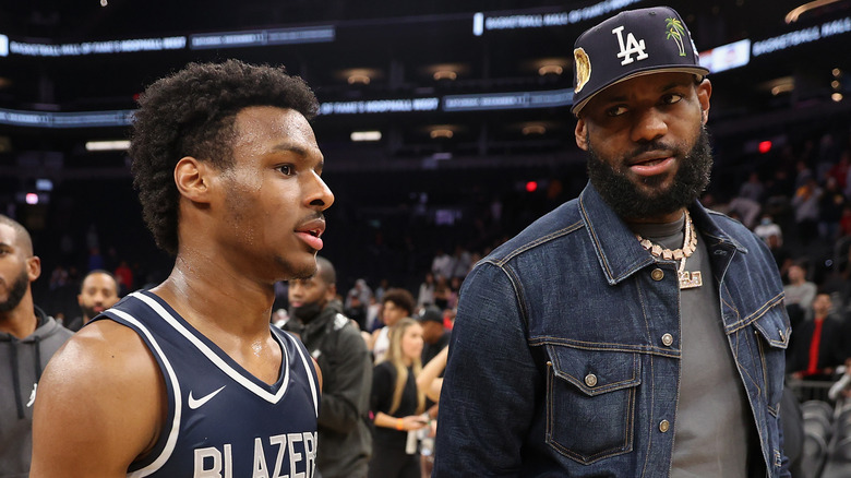 LeBron James and Bronny in arena