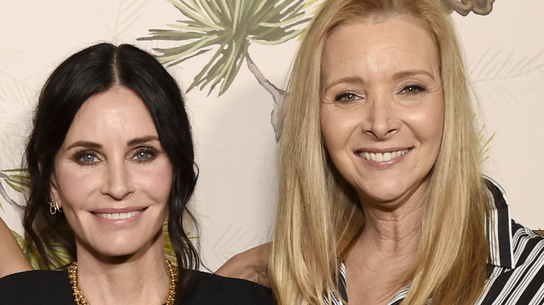 Lisa Kudrow and Courteney Cox at a premiere 