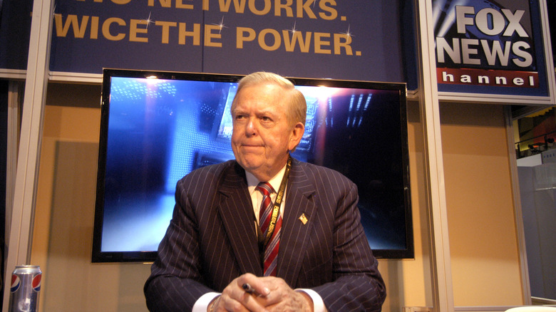 Lou Dobbs posing at Fox