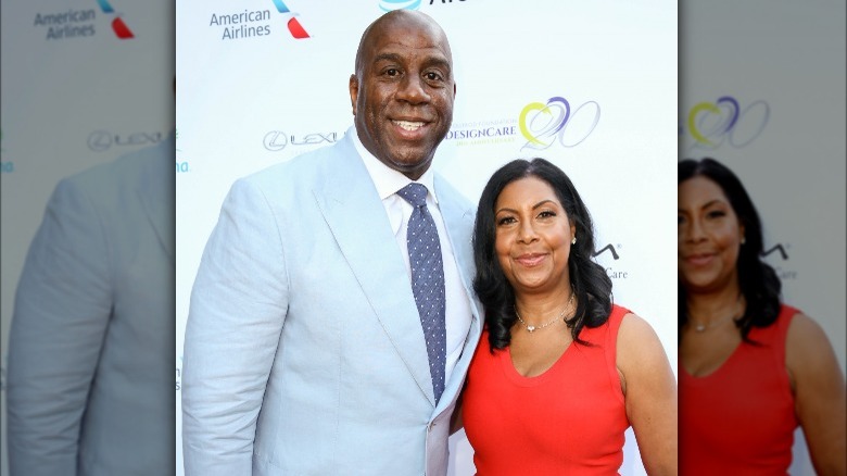 Magic Johnson and Cookie Johnson smiling