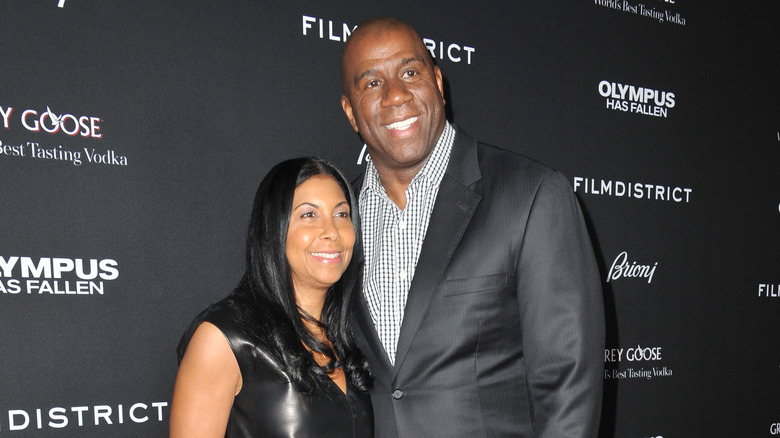 Cookie Johnson and Magic Johnson smiling