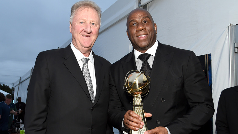 Larry Bird and Magic Johnson posing together