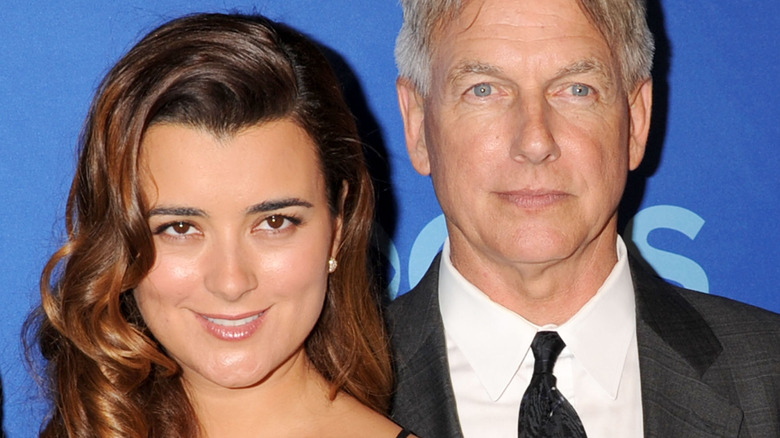 Cote de Pablo and Mark Harmon at an event 