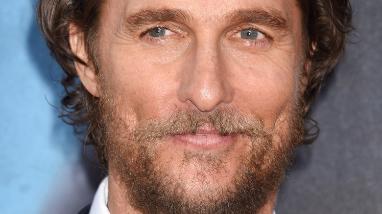 Matthew McConaughey smiles on the red carpet