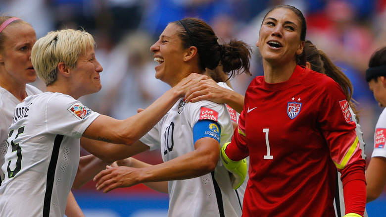 Hope Solo and Megan Rapinoe on the field