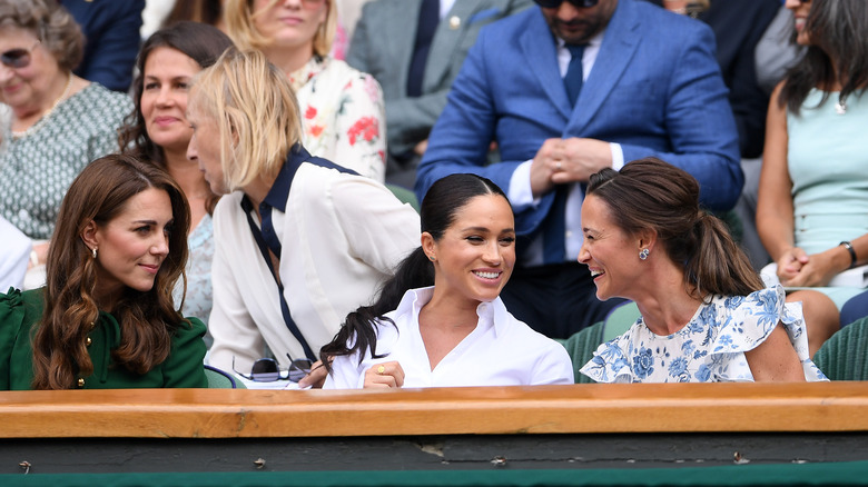 Kate Middleton, Meghan Markle, Pippa Middleton talking