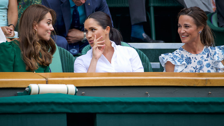 Kte Middleton, Meghan Markle, and Pippa Middleton speaking 