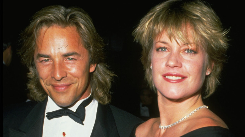 Melanie Griffith standing with Don Johnson