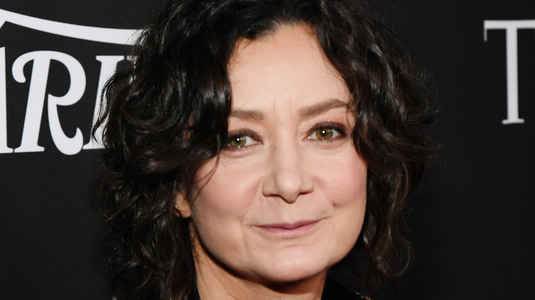 Sara Gilbert smiles at an event