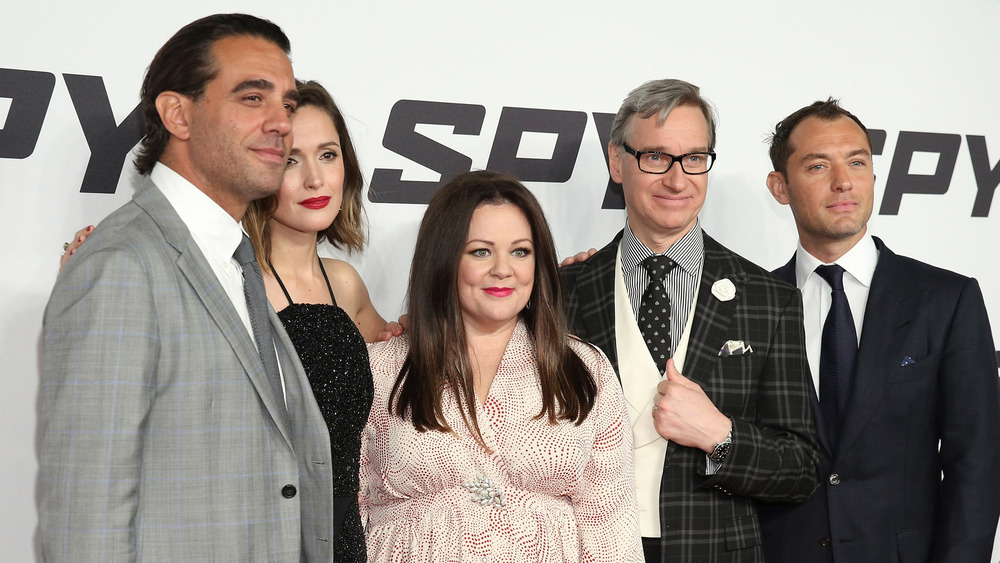 cast of Spy on red carpet with director Paul Feig