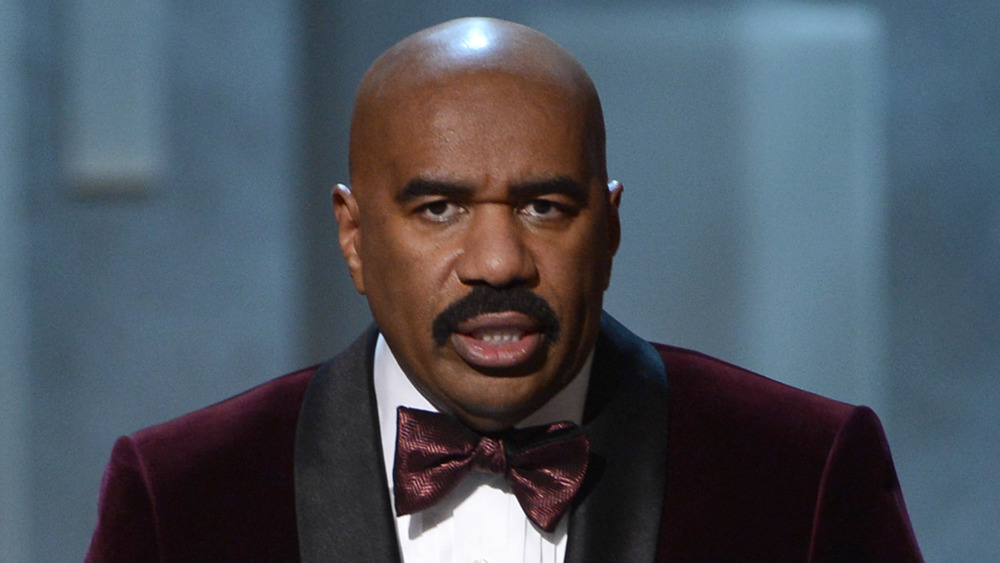 Steve Harvey looking stern, furrowing his brow 