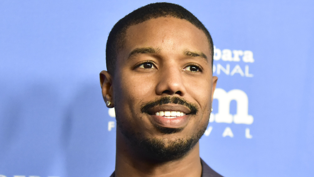 Michael B. Jordan flashing a smile