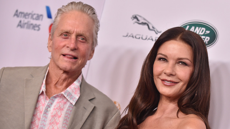 Michael Douglas and Catherine Zeta-Jones smiling broadly