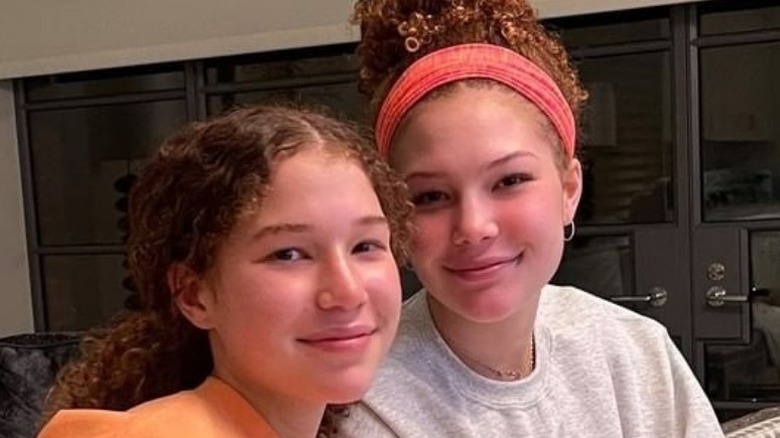 Michael Strahan's twin daughters, smiling