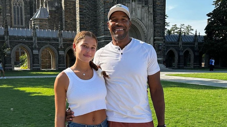 Michael Strahan posing with daughter Sophia