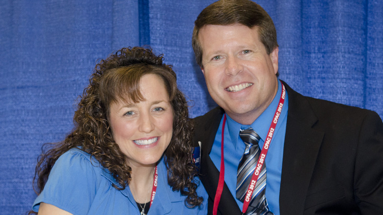 Michelle and Jim Bob Duggar smile at an event