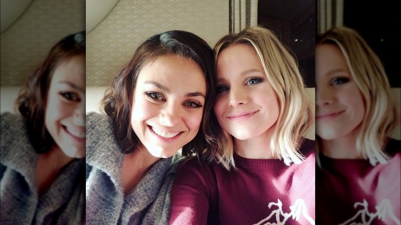 Mila Kunis posing with Kristen Bell