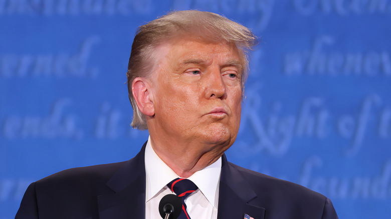 donald trump looks skeptical with pursed lips