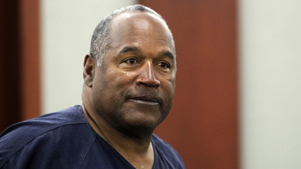 O.J. Simpson looking upset  in court