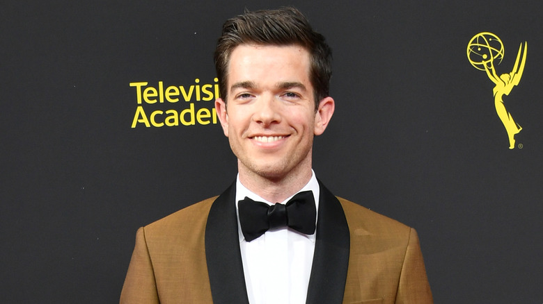 John Mulaney smiling