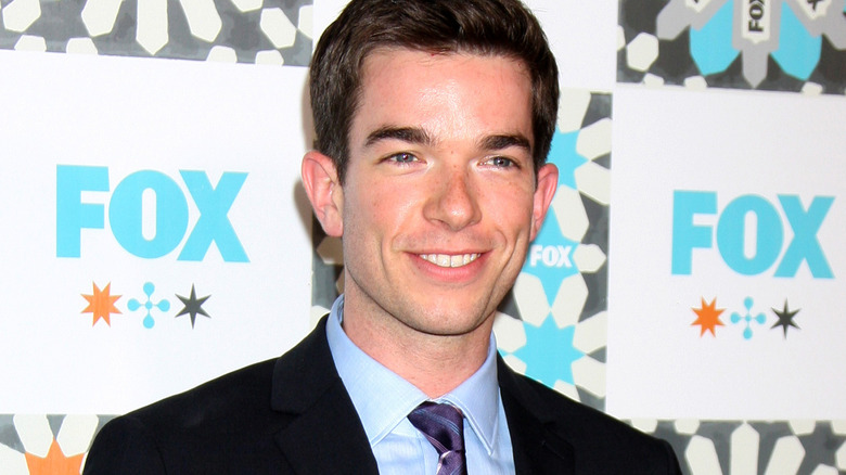 John Mulaney smiling