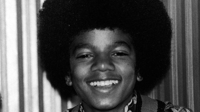 Michael Jackson as a child with afro